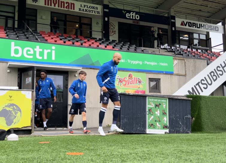 Bluebirds skipper Jazz Richards leads the warm up at the  Gundadalur Stadium